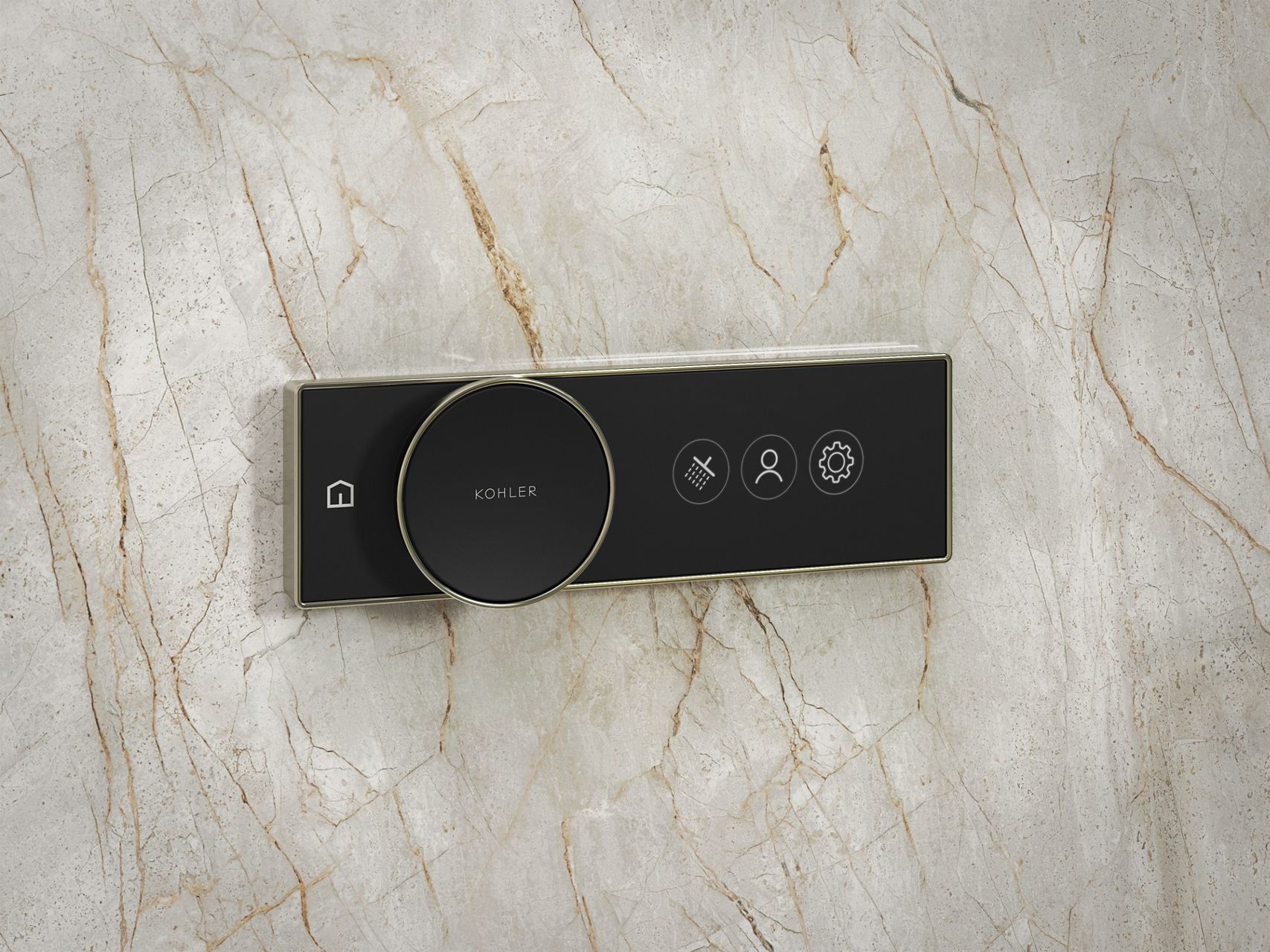 A black KOHLER Athem digital shower controller mounted on a white marble wall.