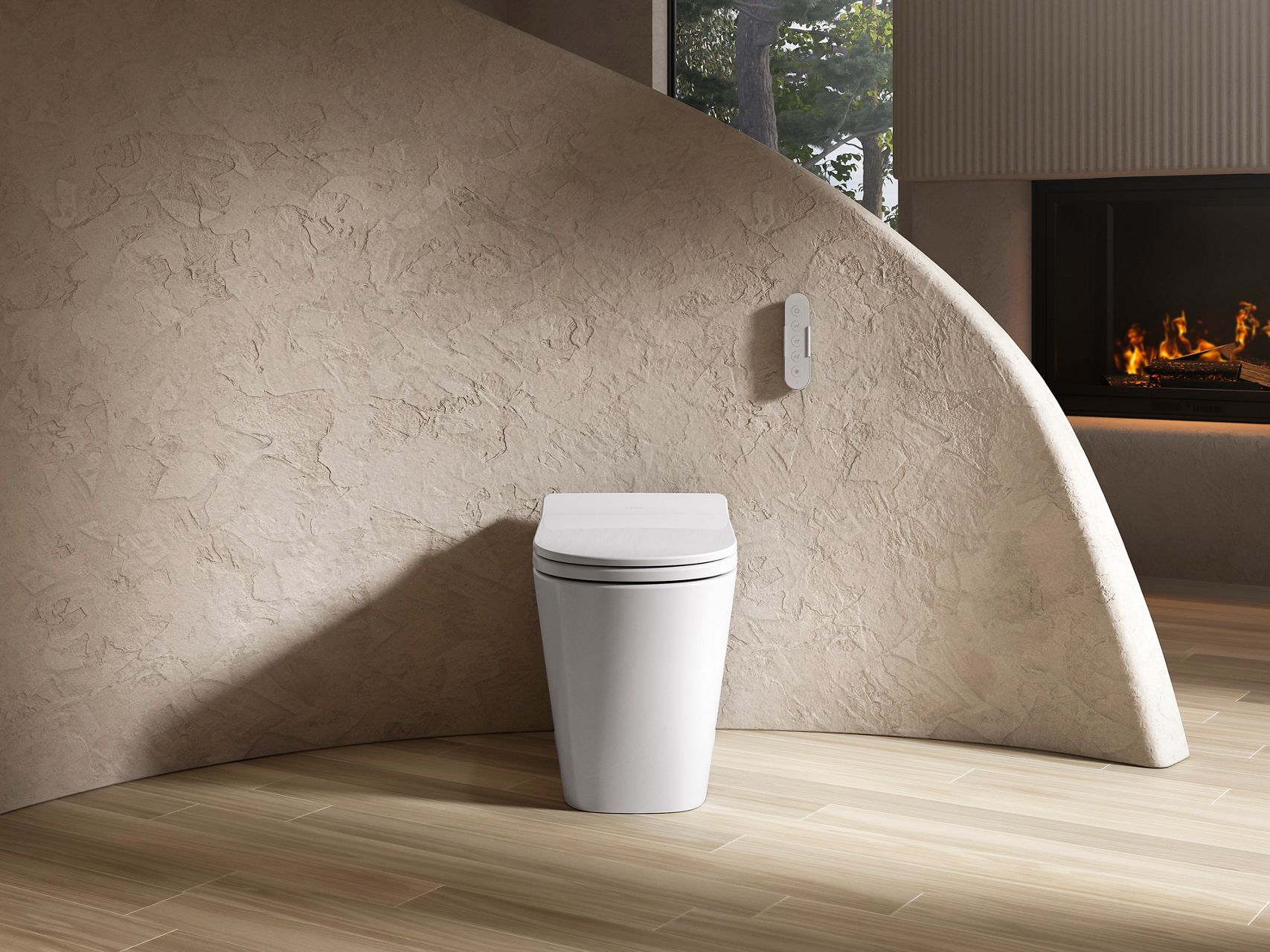 Transitional style white toilet with sleek design in neutral-colored bathroom.