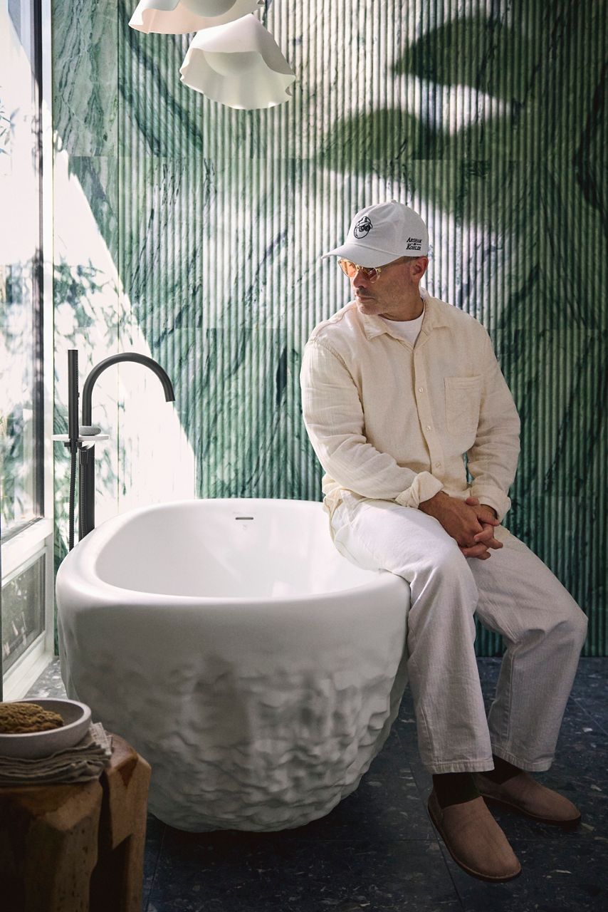 Kohler x Arsham freestanding tub in a minimalist setting.