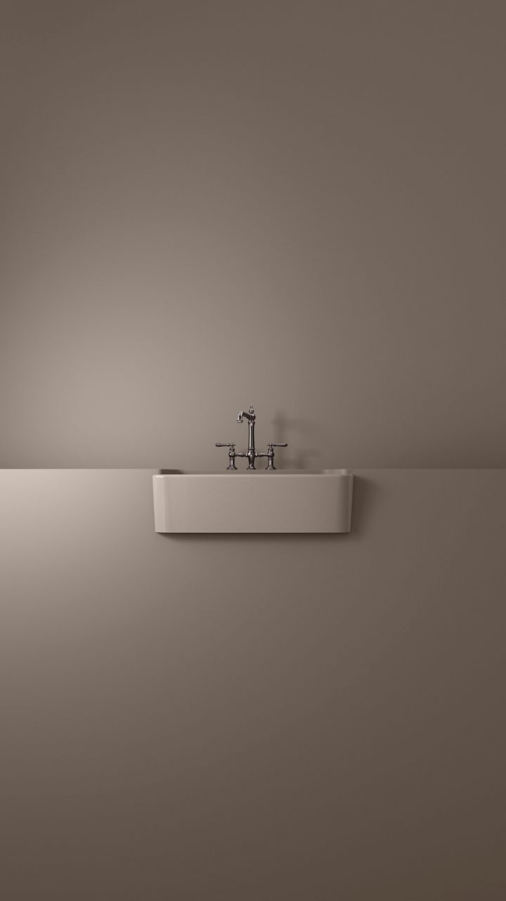 Rectangular white wall mounted sink in Truffle, a warm taupe shade with hunts of grey and brown.