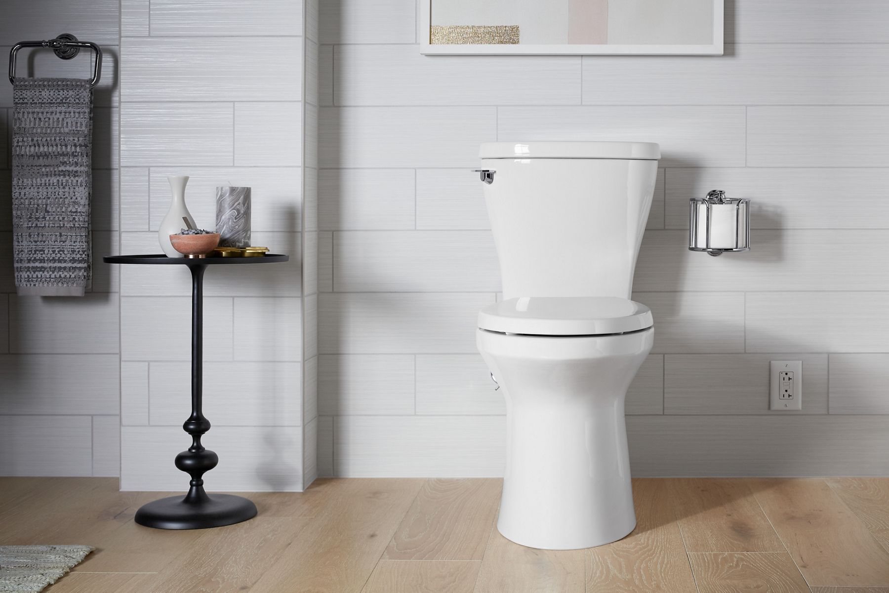 A transitional-styled toilet with smooth curves and restrained ornamentation.