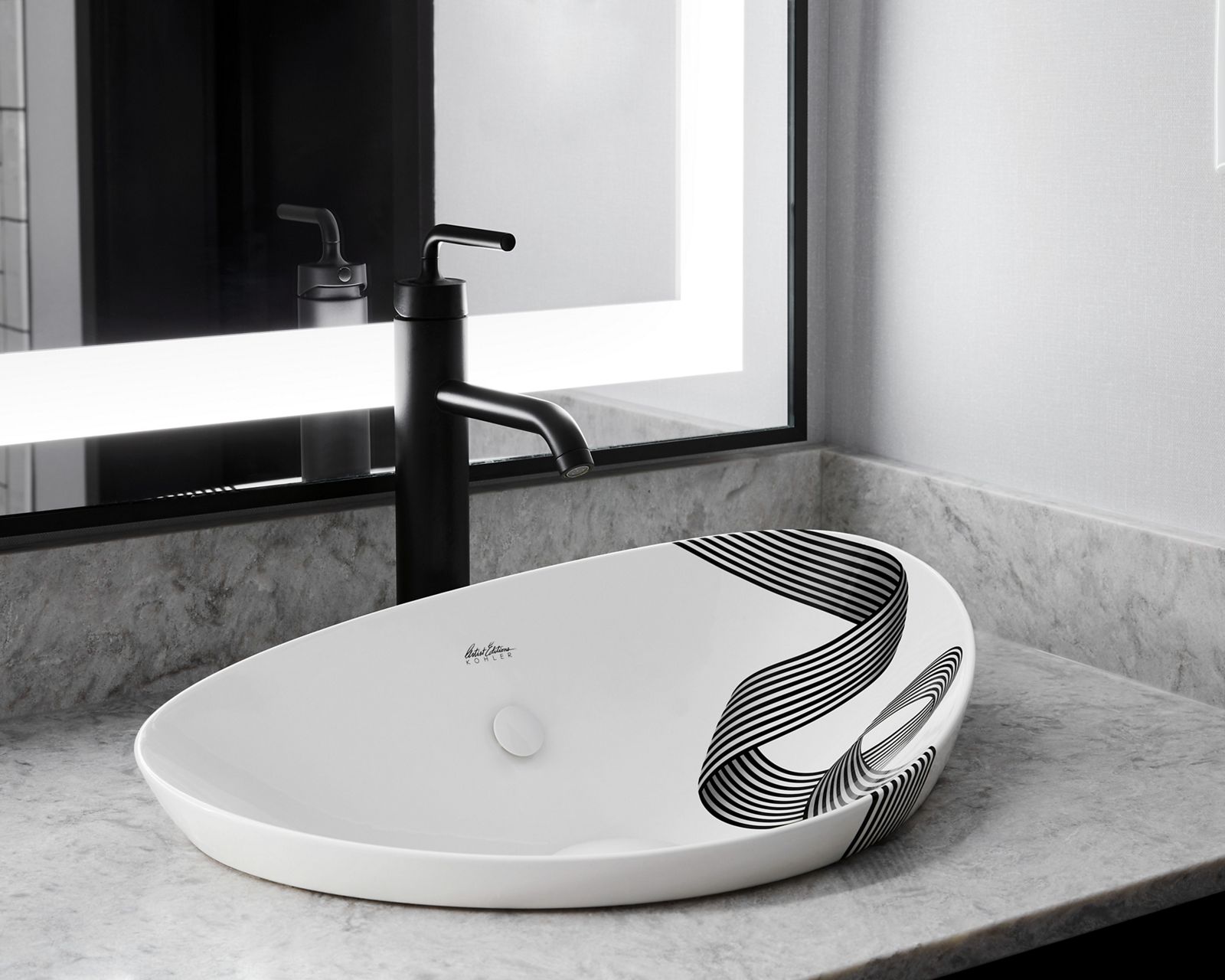 Closeup of The Veil™ sink, showing a custom black-and-white ribbon design which is created using a ceramic ink transfer technique.