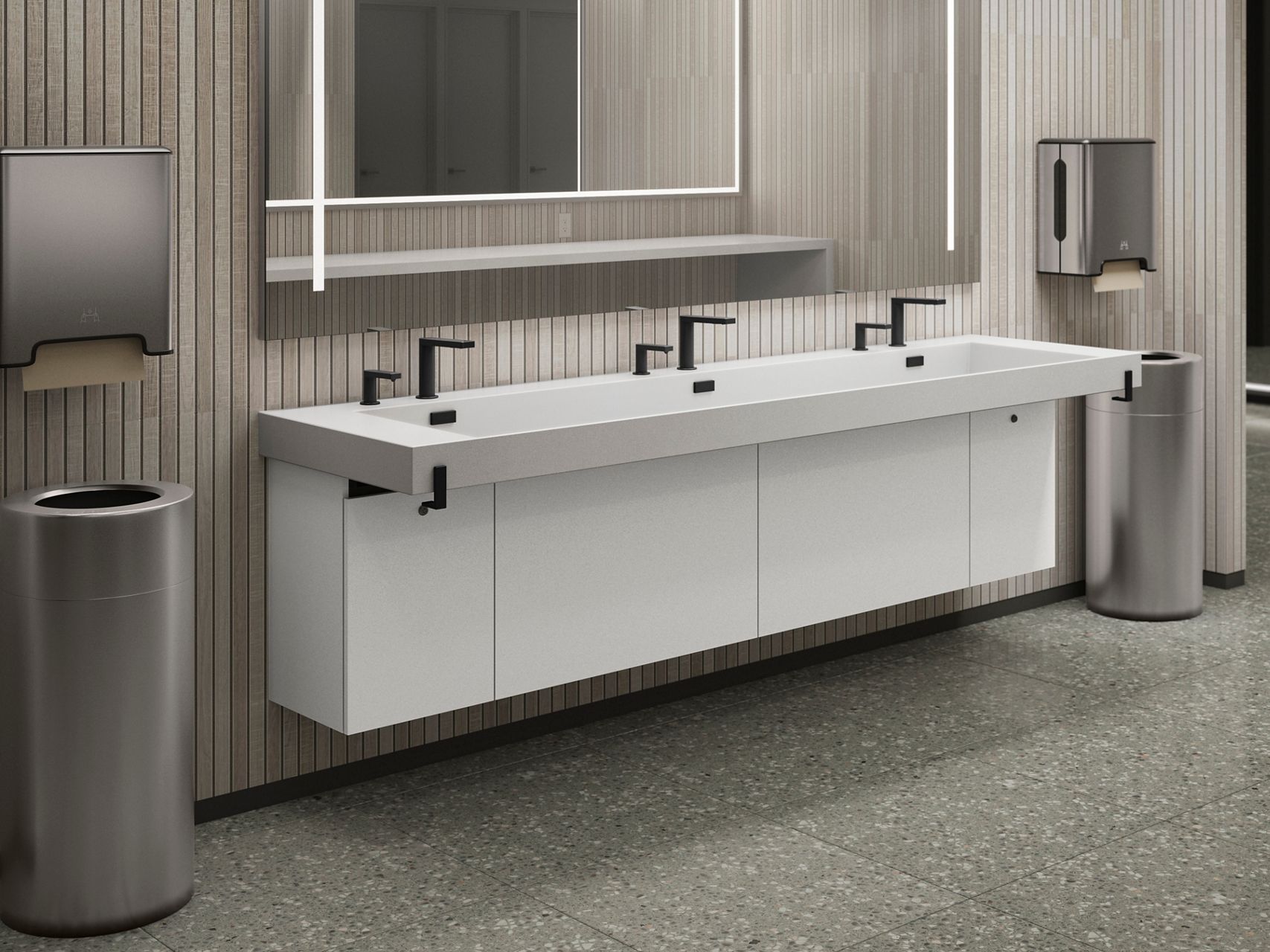 A white wall-mount sink basin for commercial bathrooms in a modern bathroom.