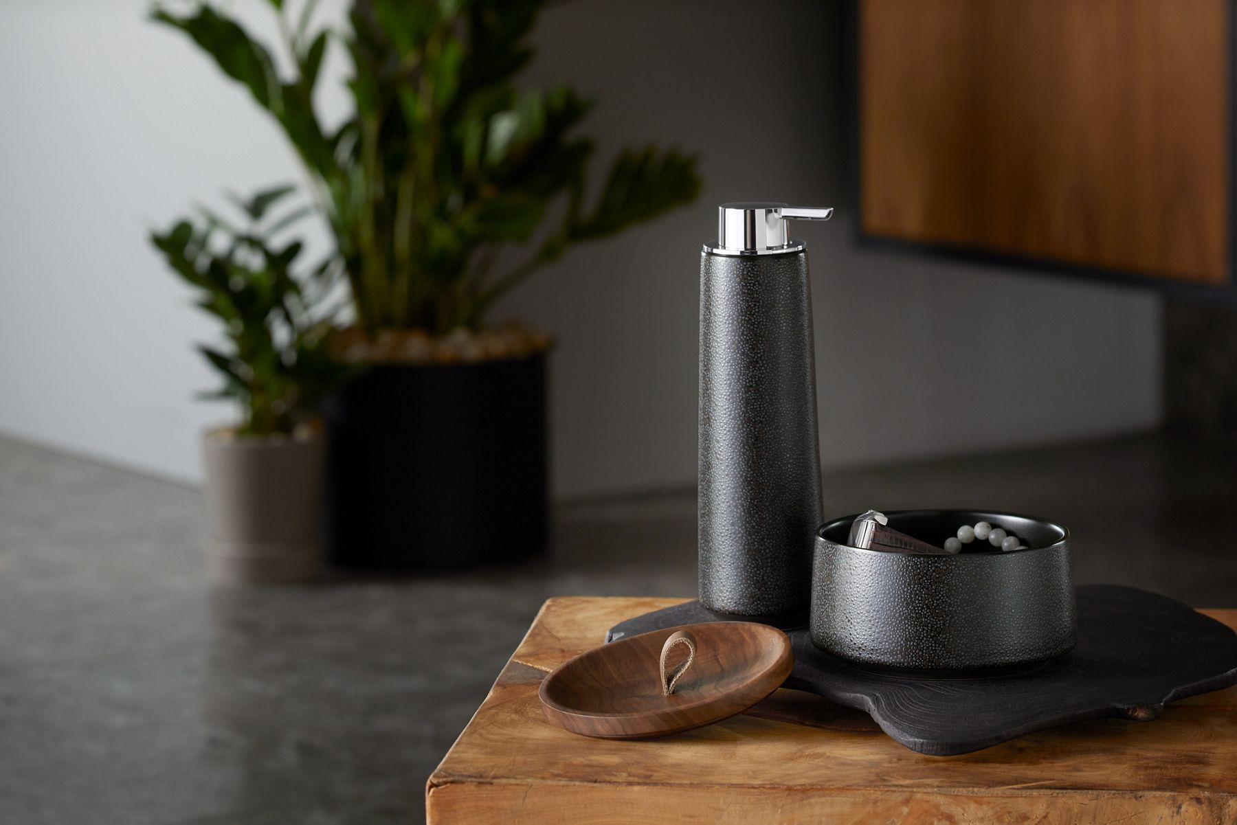 KOHLER Bente soap dispenser, tumbler, and lidded canister on a wooden tray