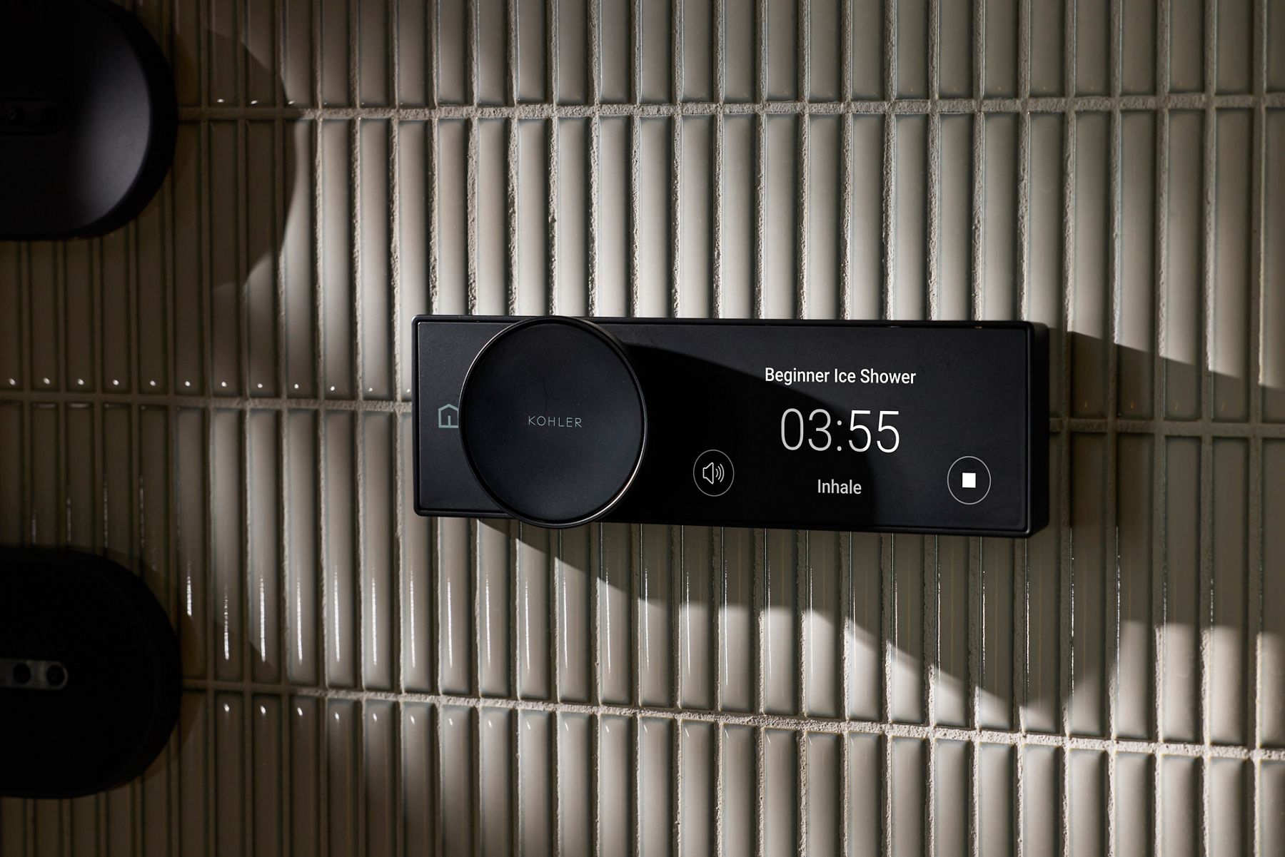 Kohler Beginner Ice Shower control panel displaying a timer set to 3:55, wit ha button labeled “inhale”.