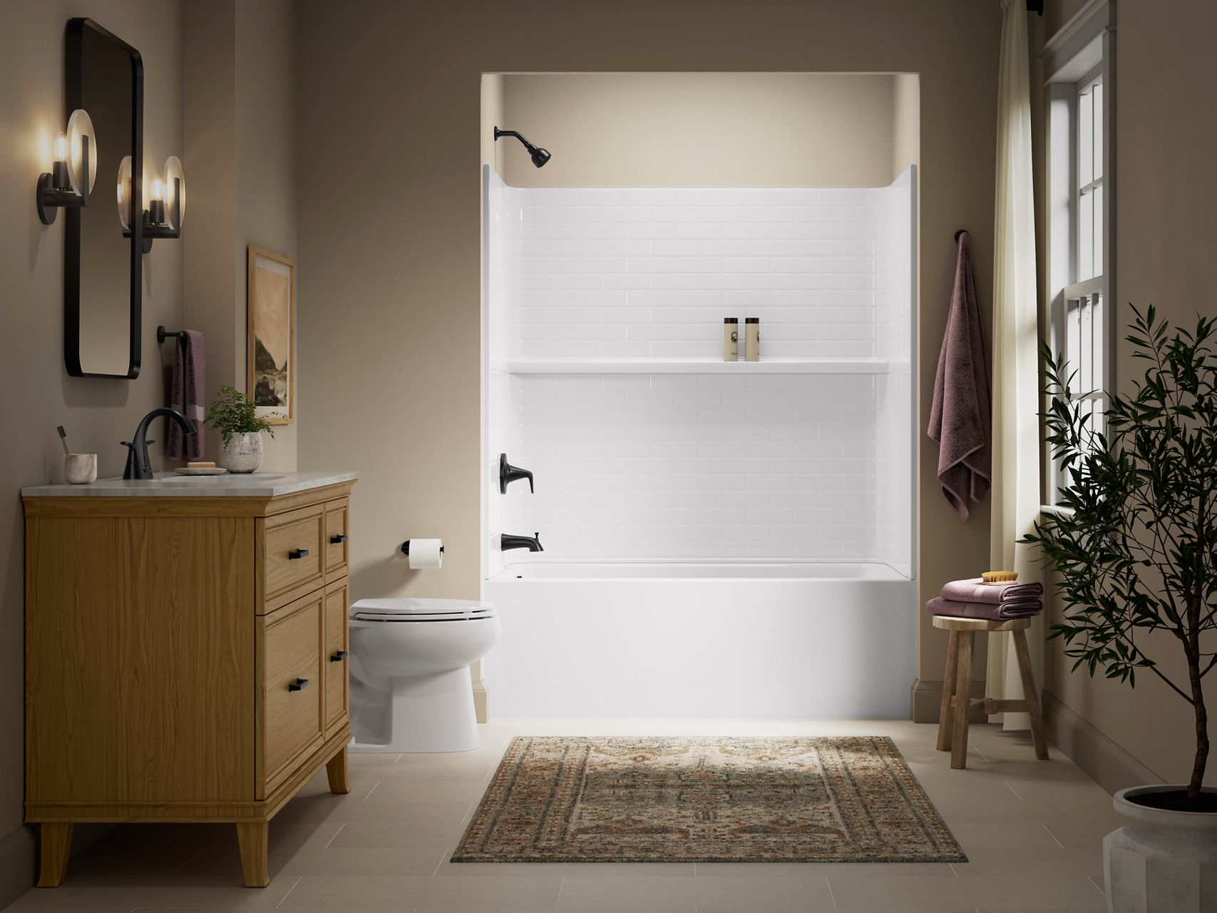 Forum™ Traverse® alcove bath and shower combo in a serene bathroom with natural accents.