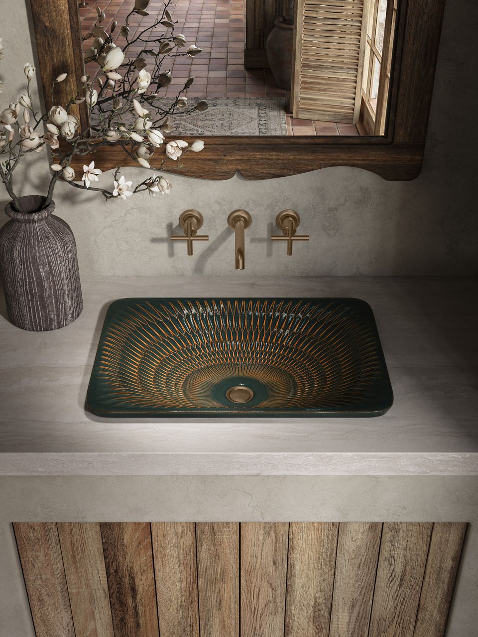 Overhead view of bathroom setup featuring patterned sink basin, brass fixtures, and warm natural textures.