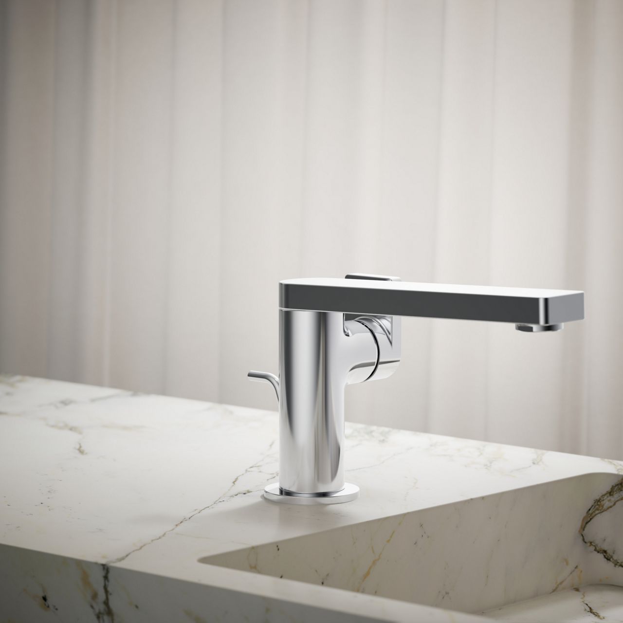 Polished chrome bathroom faucet installed on a white marble countertop beside an integrated sink in a modern bathroom.