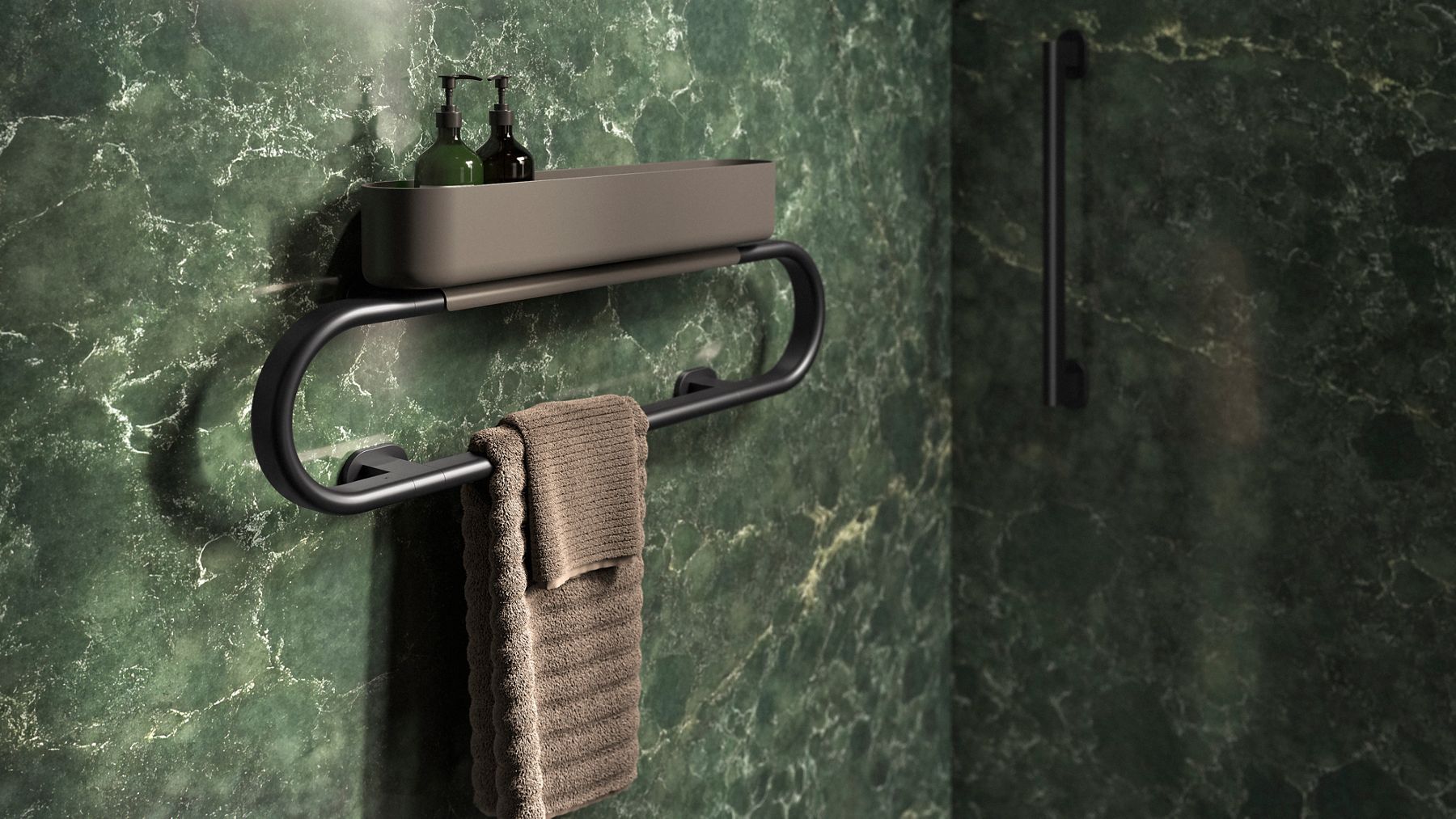 Matte black towel shelf and towel bar mounted on a green marble wall, displaying folded towels and bath accessories in a modern bathroom setting.