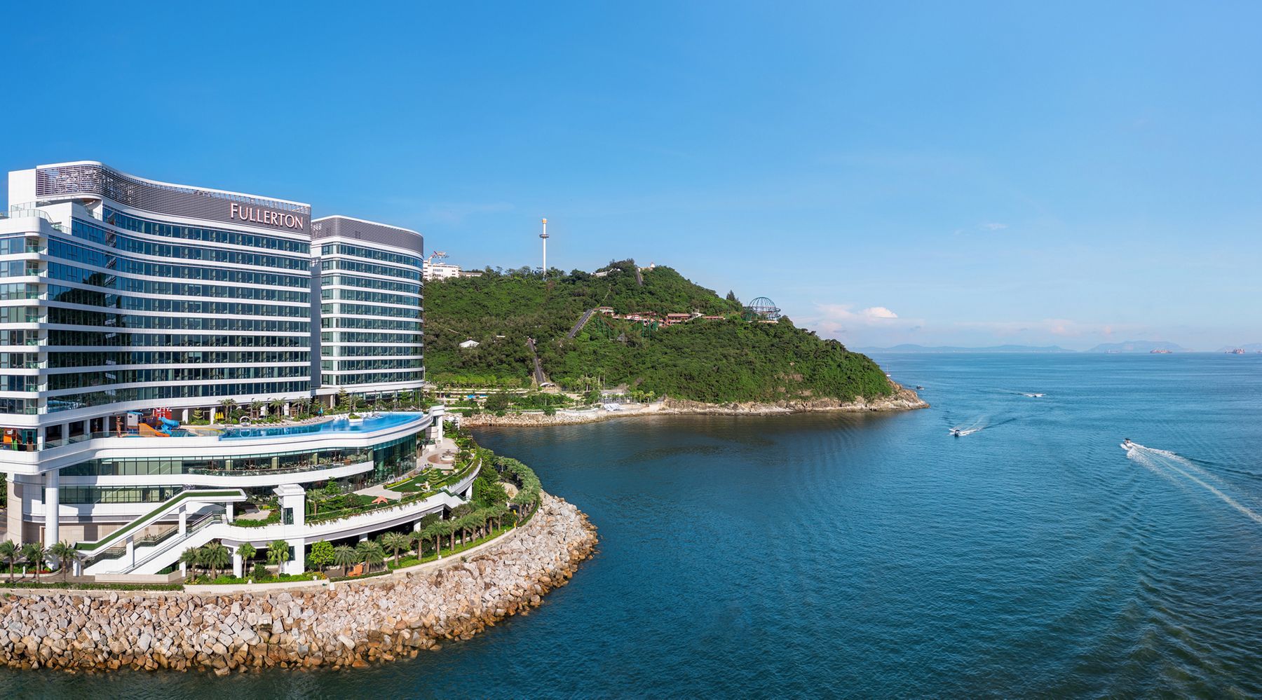 An exterior view of the Fullerton Ocean Park Hotel in Hong Kong along the South China Sea.