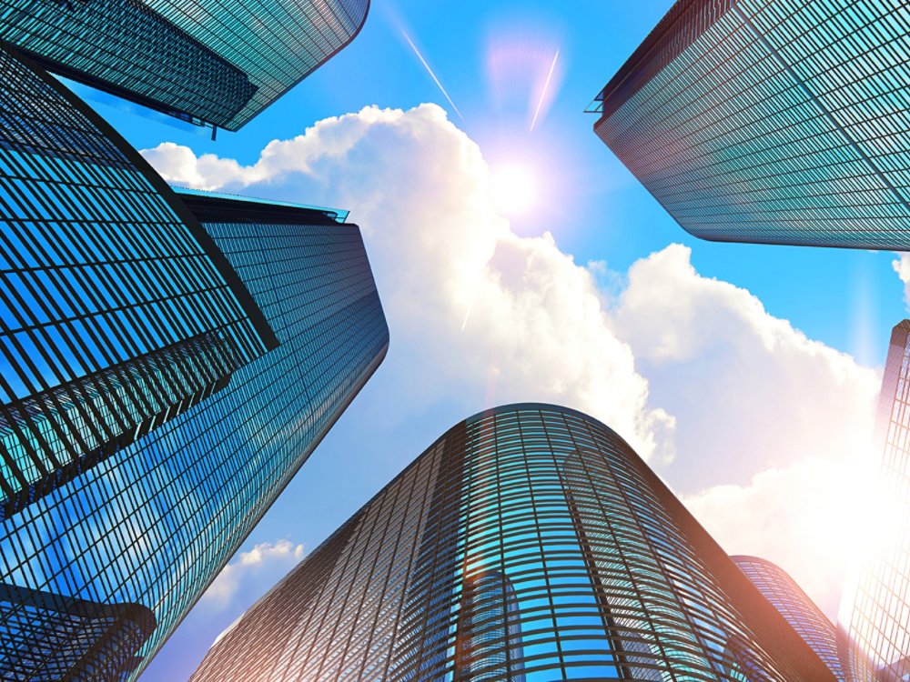 Downtown corporate business district architecture concept: 3D render illustration of the glass reflective office buildings skyscrapers against blue sky with clouds and sun light