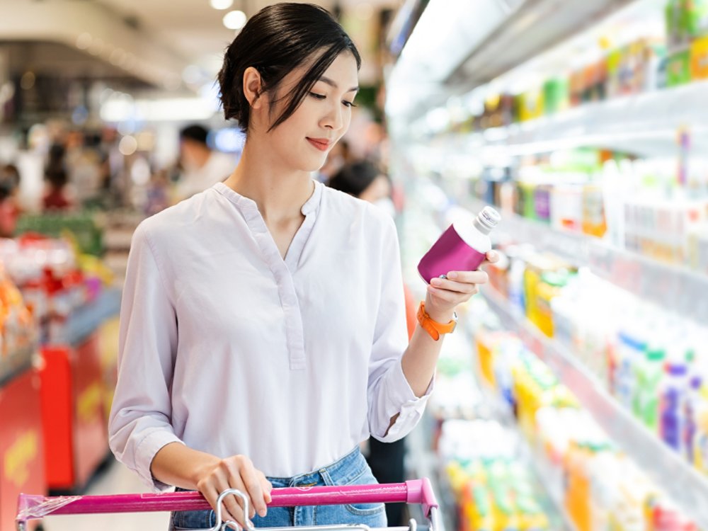 Asian woman going to the supermarket to buy supplies
