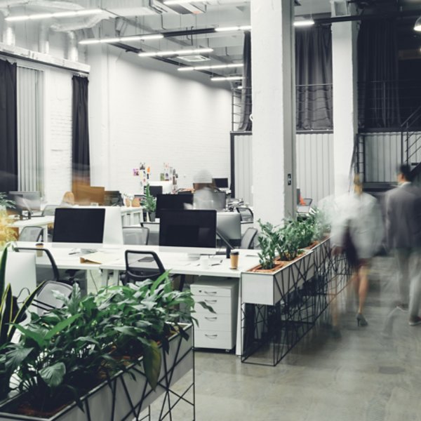 modern open space office interior with blurred business colleagues