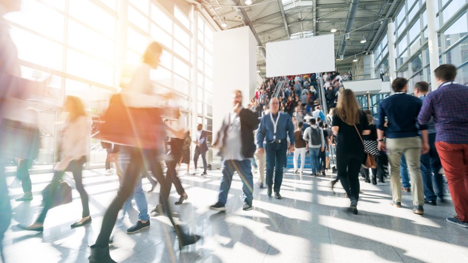 blurred people at a trade fair