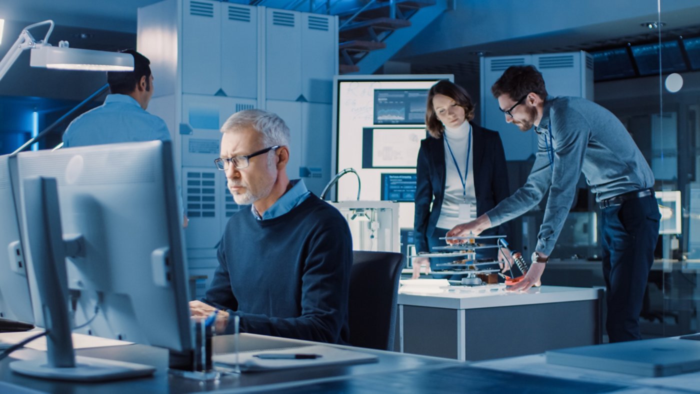 Diverse International Team of Industrial Engineers and Scientists Working in Research Laboratory and Development Center. People Working with 3D Printing, Using Computers, Designing Hardware