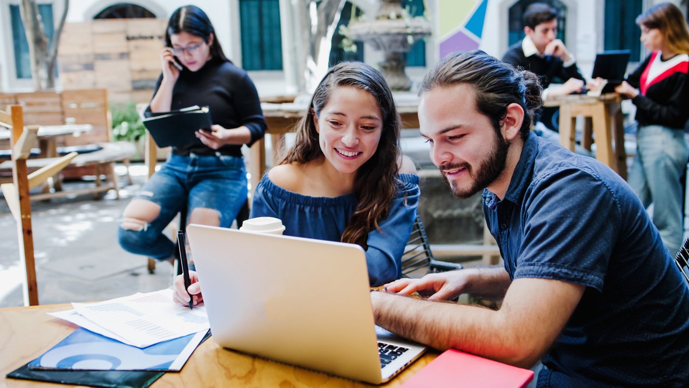 Mexican university students working on a project