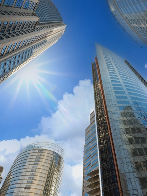 view to the sky surrounded by skyscrapers of Sydney