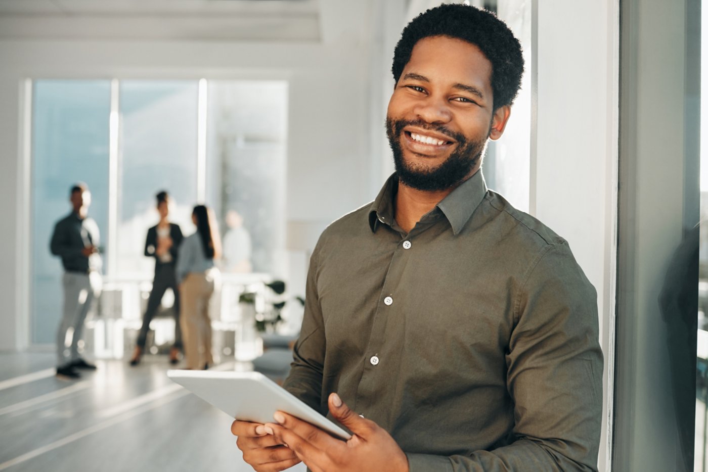Portrait, digital tablet and black man in office happy, smile and empowered, ambition and mindset. Face and business man or ceo at startup company for management or online project at workplace.