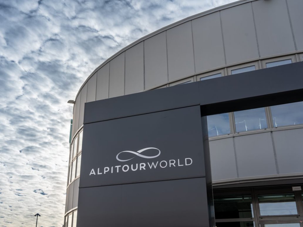 A shot  of Altipour building with the sky in the background