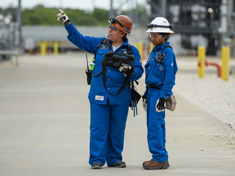 @ workers at Dow discussing a business task