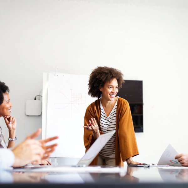 Collaboration and analysis by business people working in modern office
