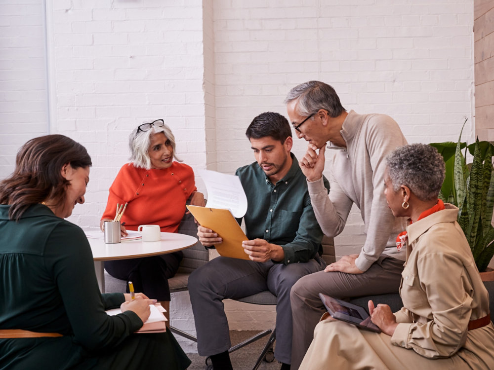 Multiethnic and multi age group business team meeting and Brainstorming