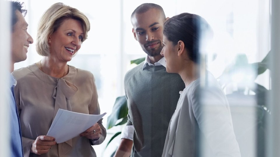 People discussing a project in the office
