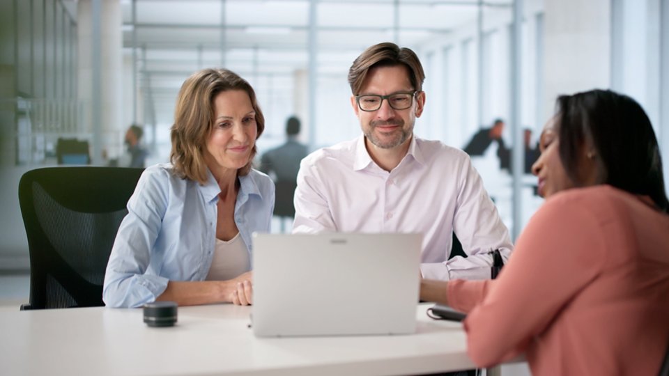 still image from adobe stock video 1262462139 of 2 people talking to a bank representative