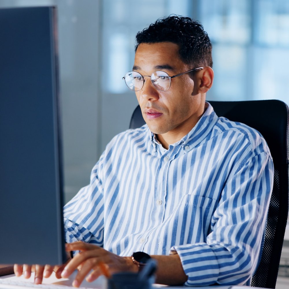 Typing, research and computer with business man in office