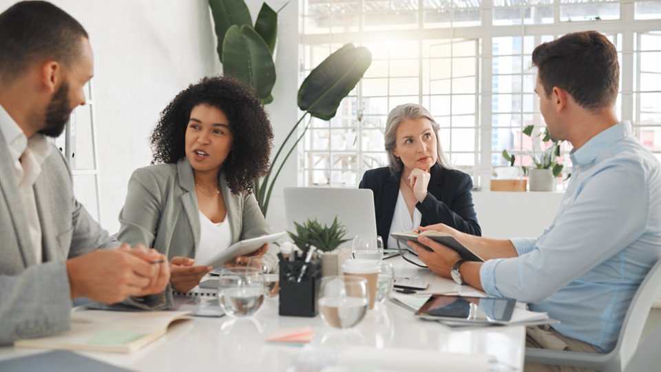 Office, teamwork and business people with discussion in meeting, planning and case review in law firm. Employees, lawyers and mentor with listening for justice updates, corporate project and ideas