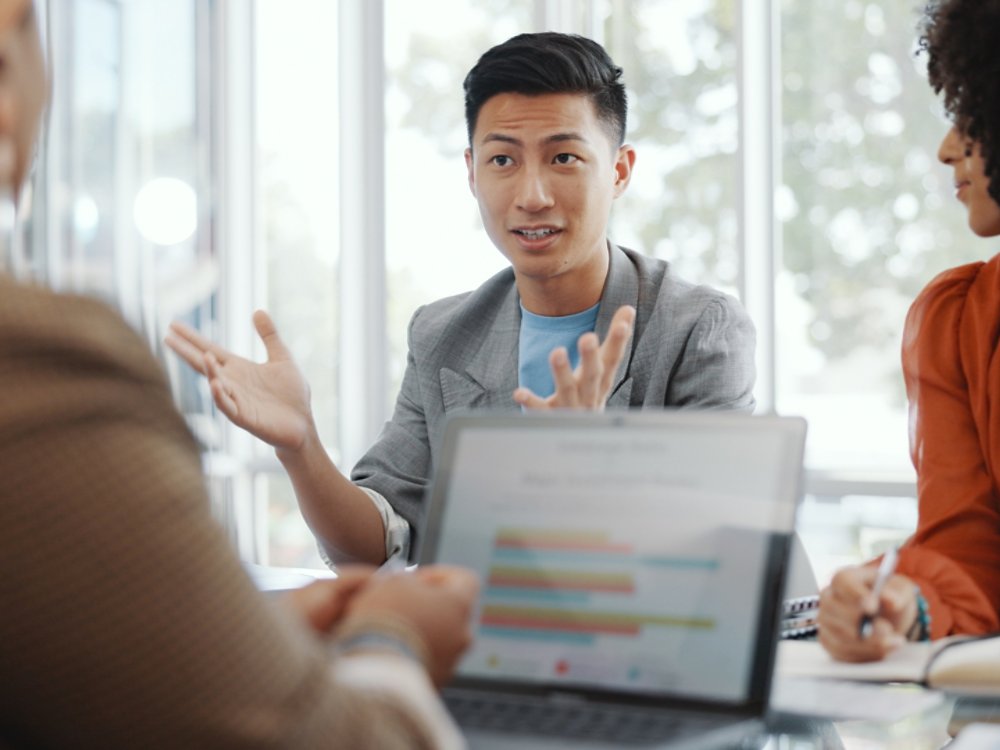 CEO, meeting or business people planning a strategy to increase sales for financial growth in office building. Team work, laptop or senior manager talking or speaking of project goals to employees