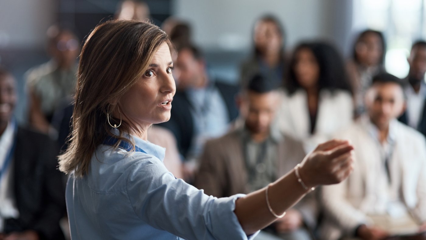 person speaking at a conference