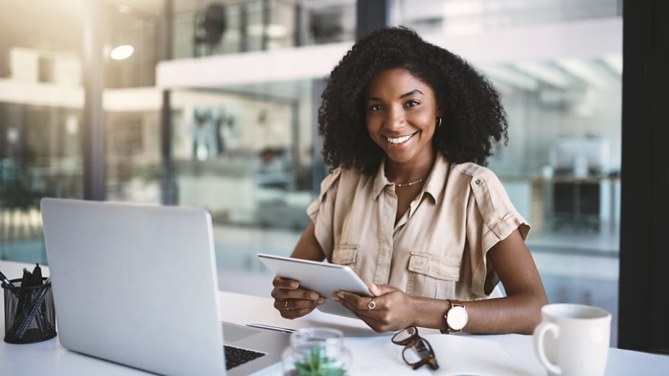 businesswoman working on her laptop in the office