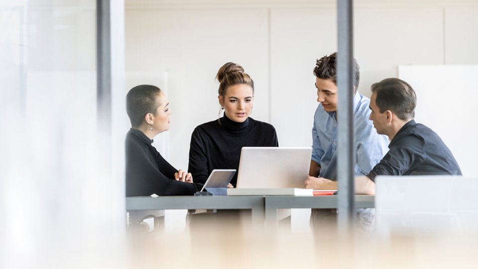 Young business people having a meeting in office