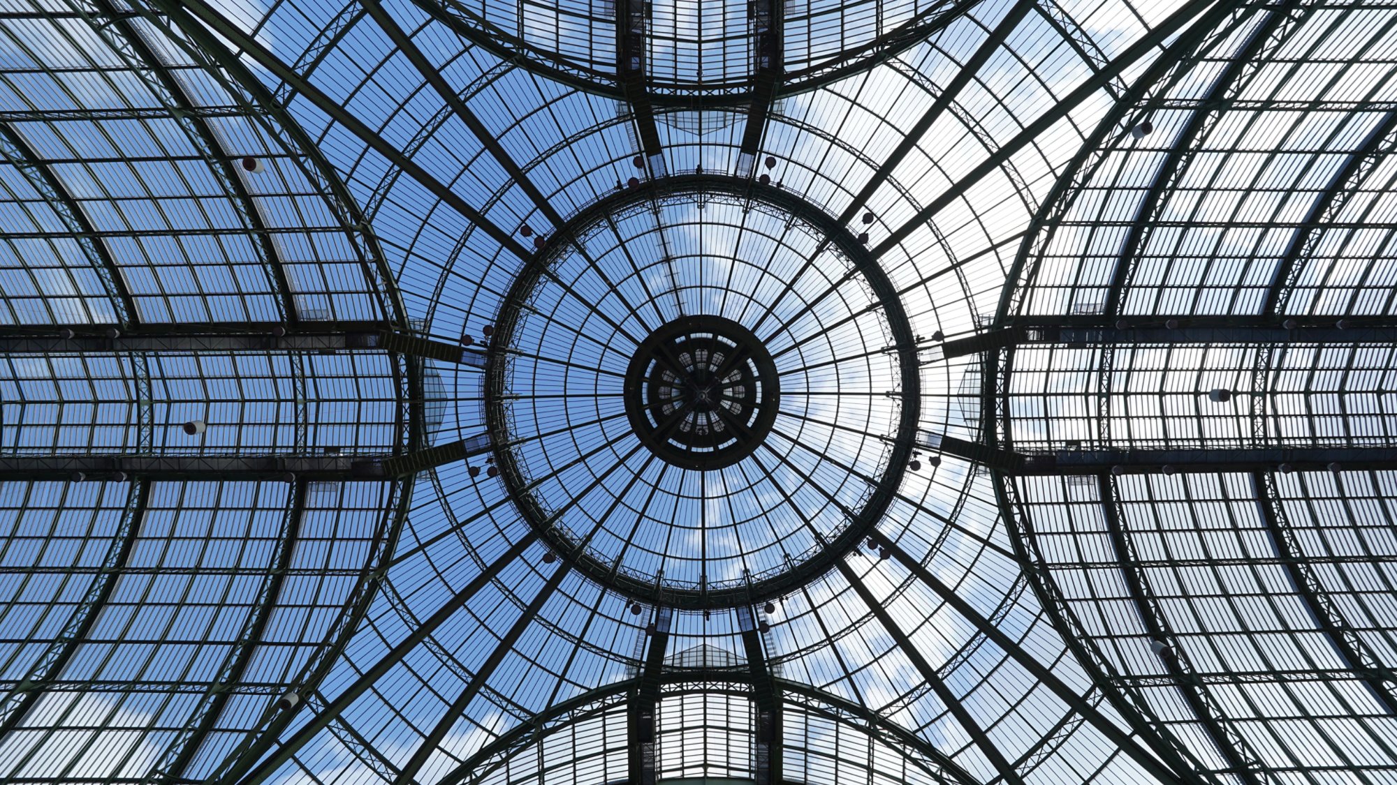 glass dome of a great palace under the blue sky.