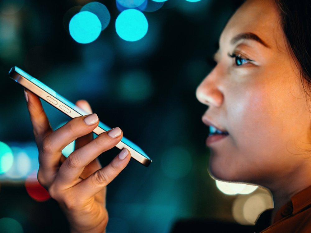 Person holding smartphone at night
