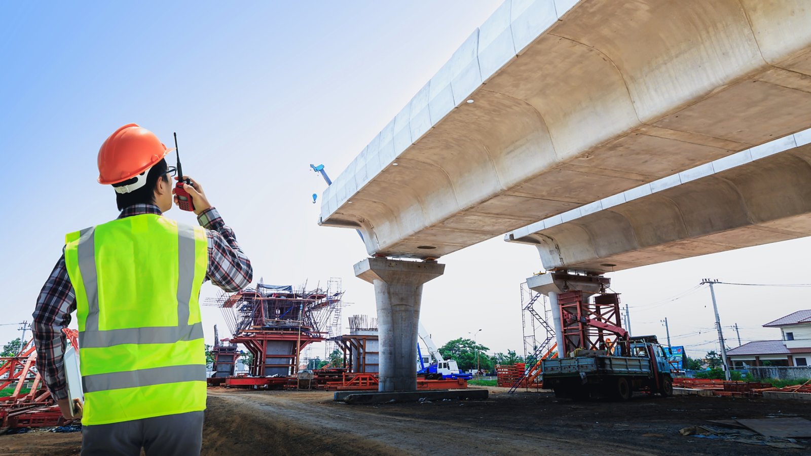 Engineers design and supervise road construction