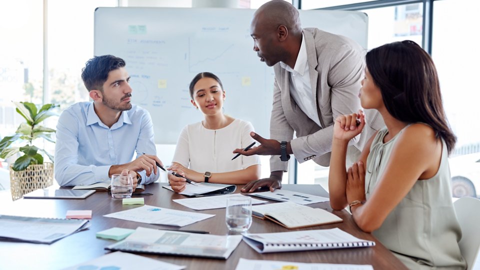Project management, leadership and planning with business people in meeting for marketing strategy, consulting and teamwork. Collaboration, growth and future with employees in office for research.