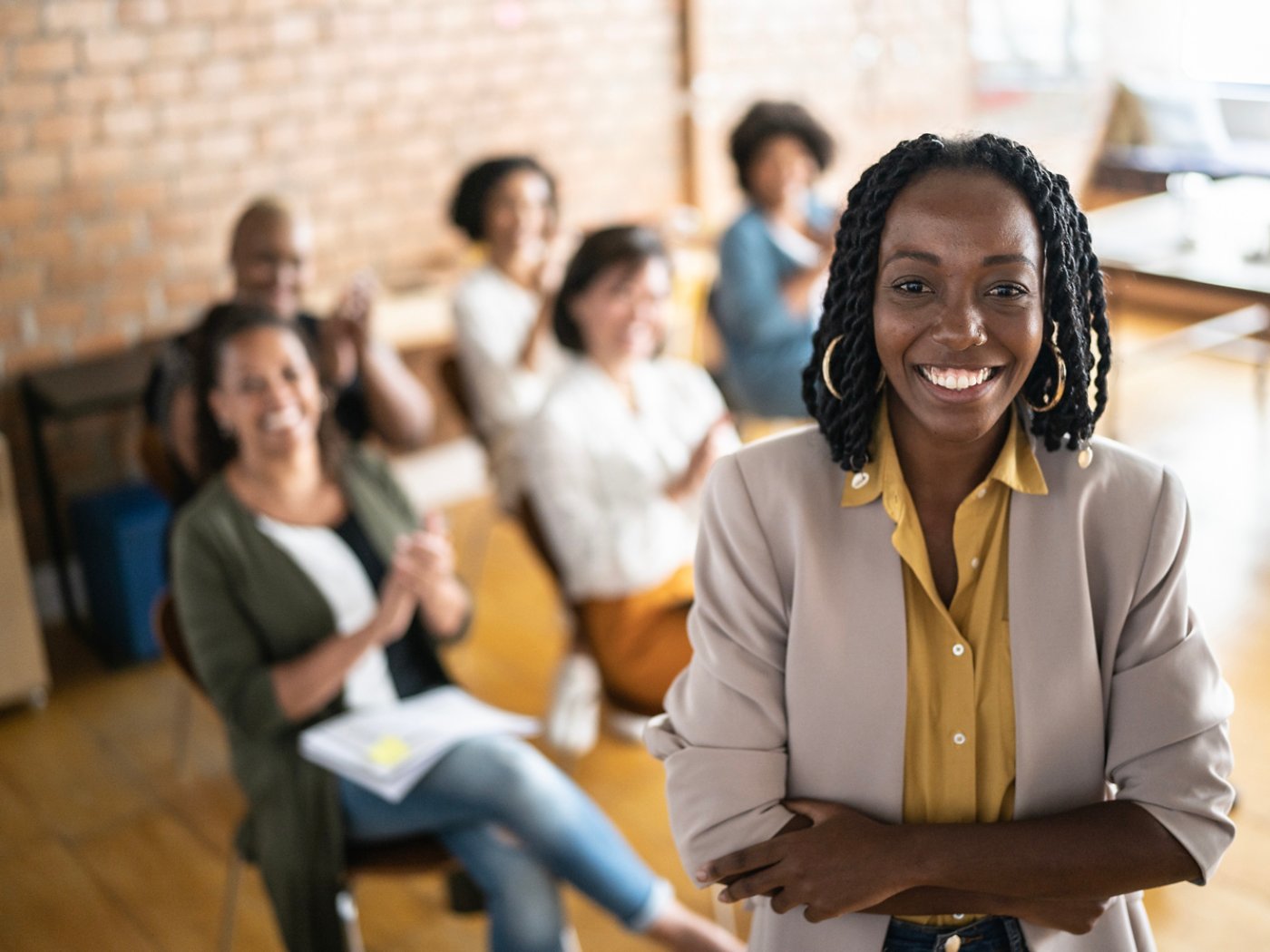 Portrait of businesswoman delivering a speech during a conference