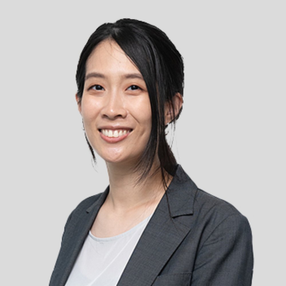 Professional woman in gray blazer 