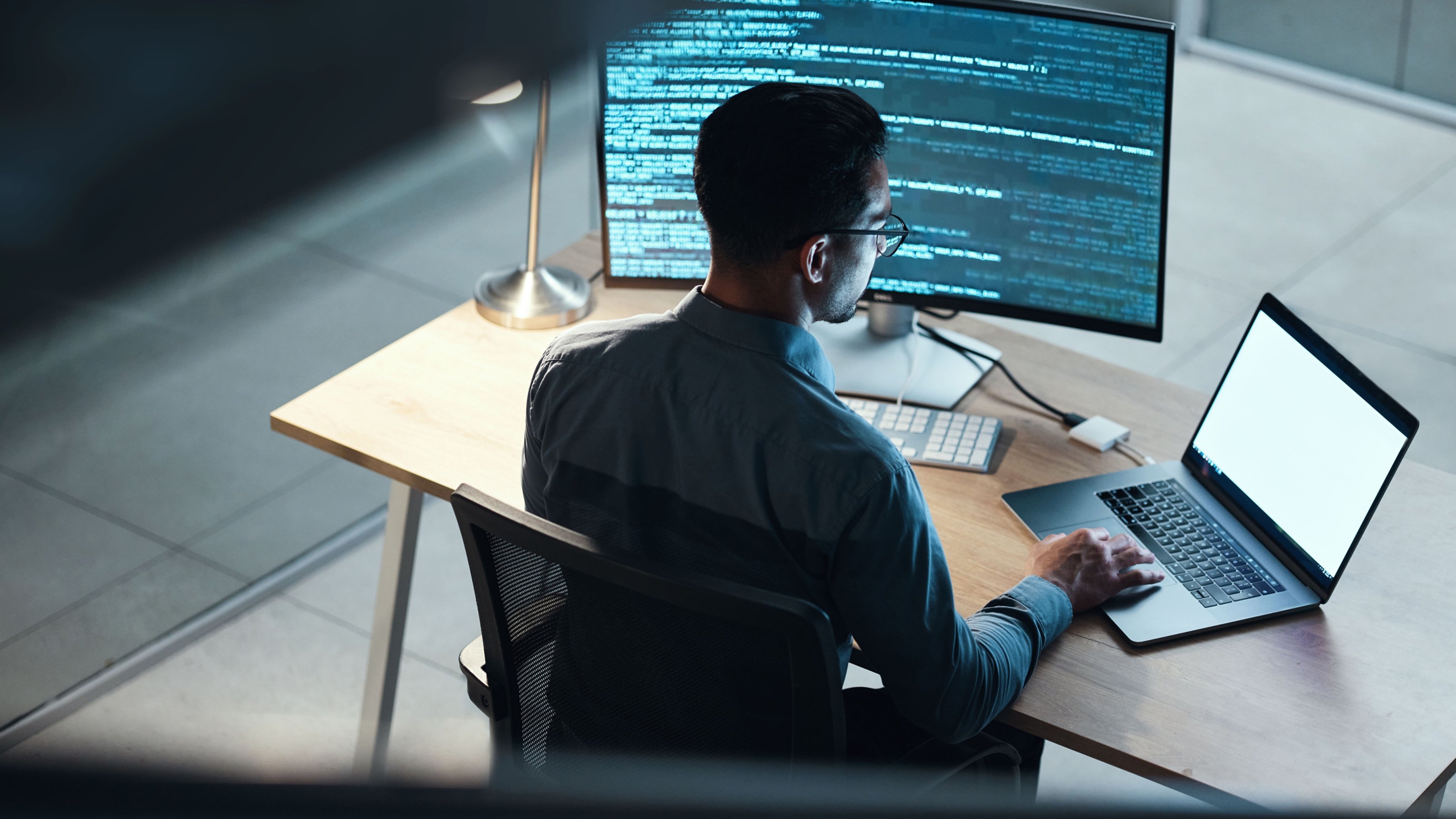 man working at computer
