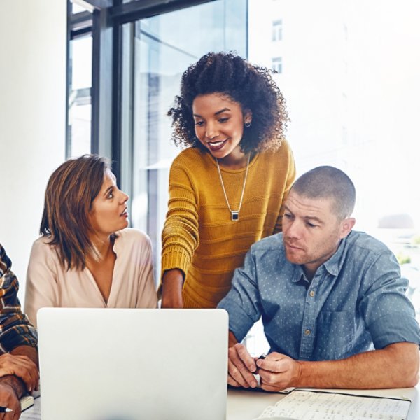 Web designer, planning and team in office with laptop, market research or problem solving in development of project. Website, design and people with technology for online marketing, SEO or strategy.