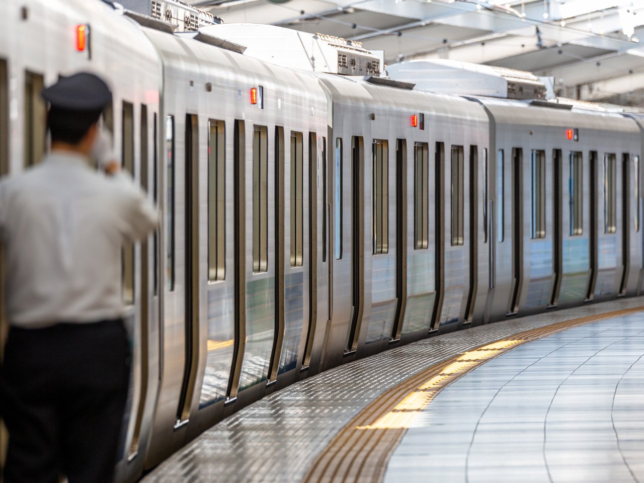 Train conductor standing on platform