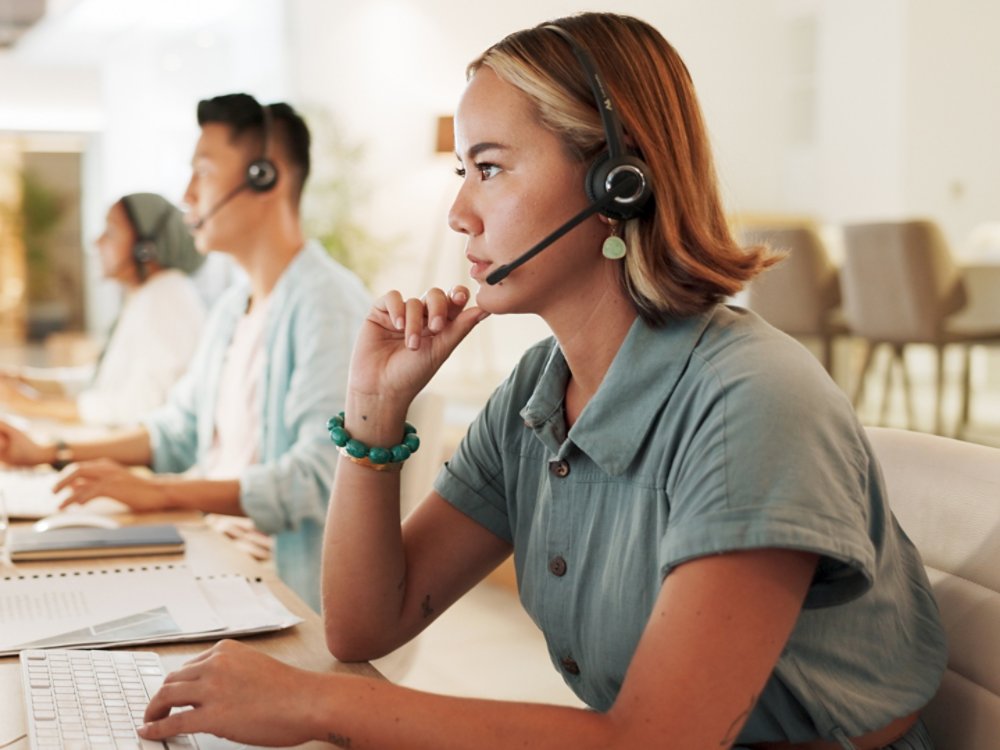 Call center, agent and thinking with woman in office for contact us, communication and customer service. Saleswoman, help desk and technical support with person in consulting agency for telemarketing.
