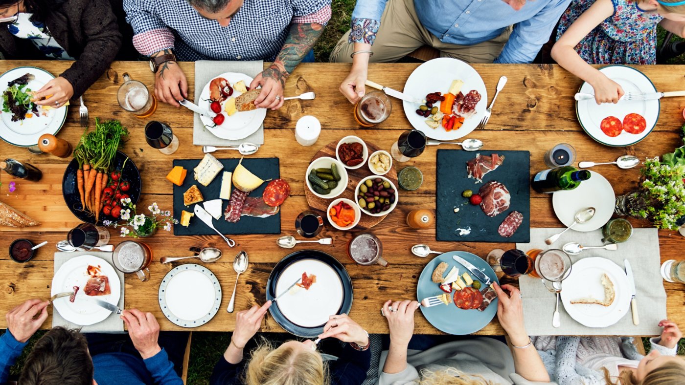 people sitting around the dinner table