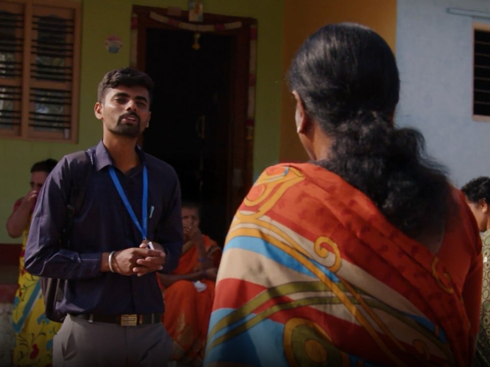 Business representative talking to customers