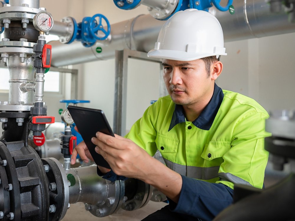 Engineer with tablet inside