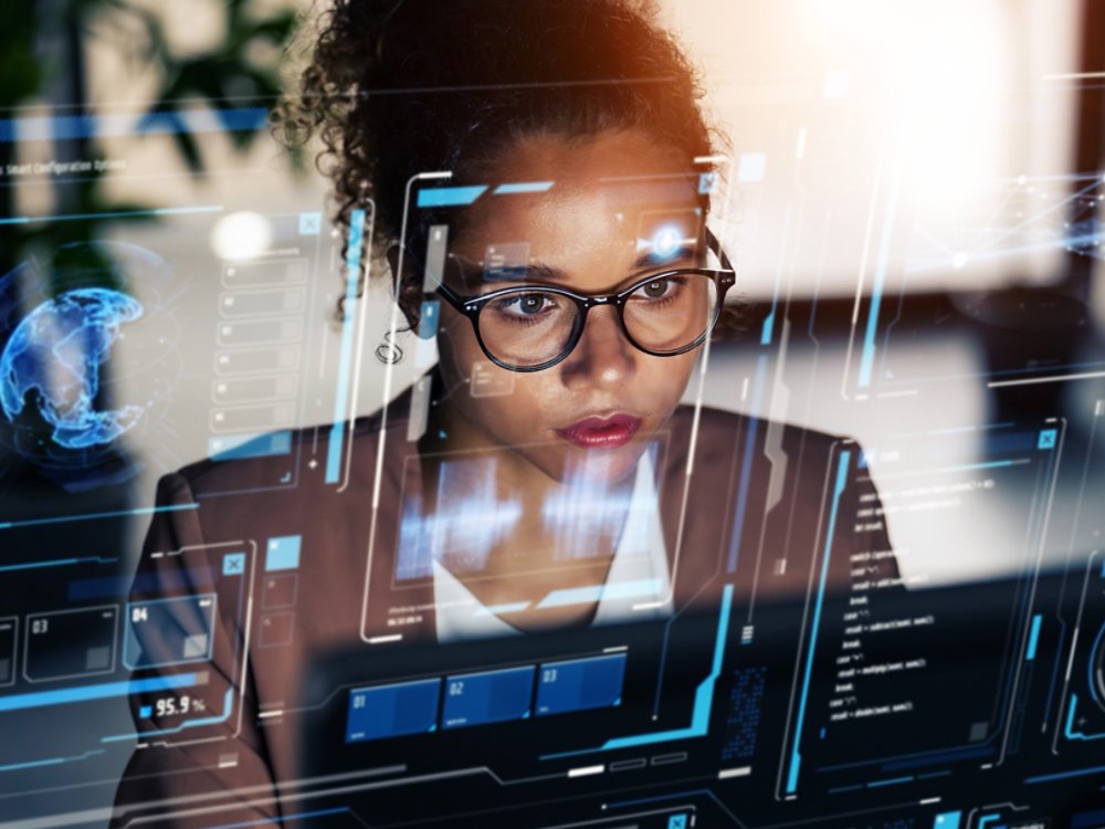 Black woman working in office and futuristic graphical user interface concept.