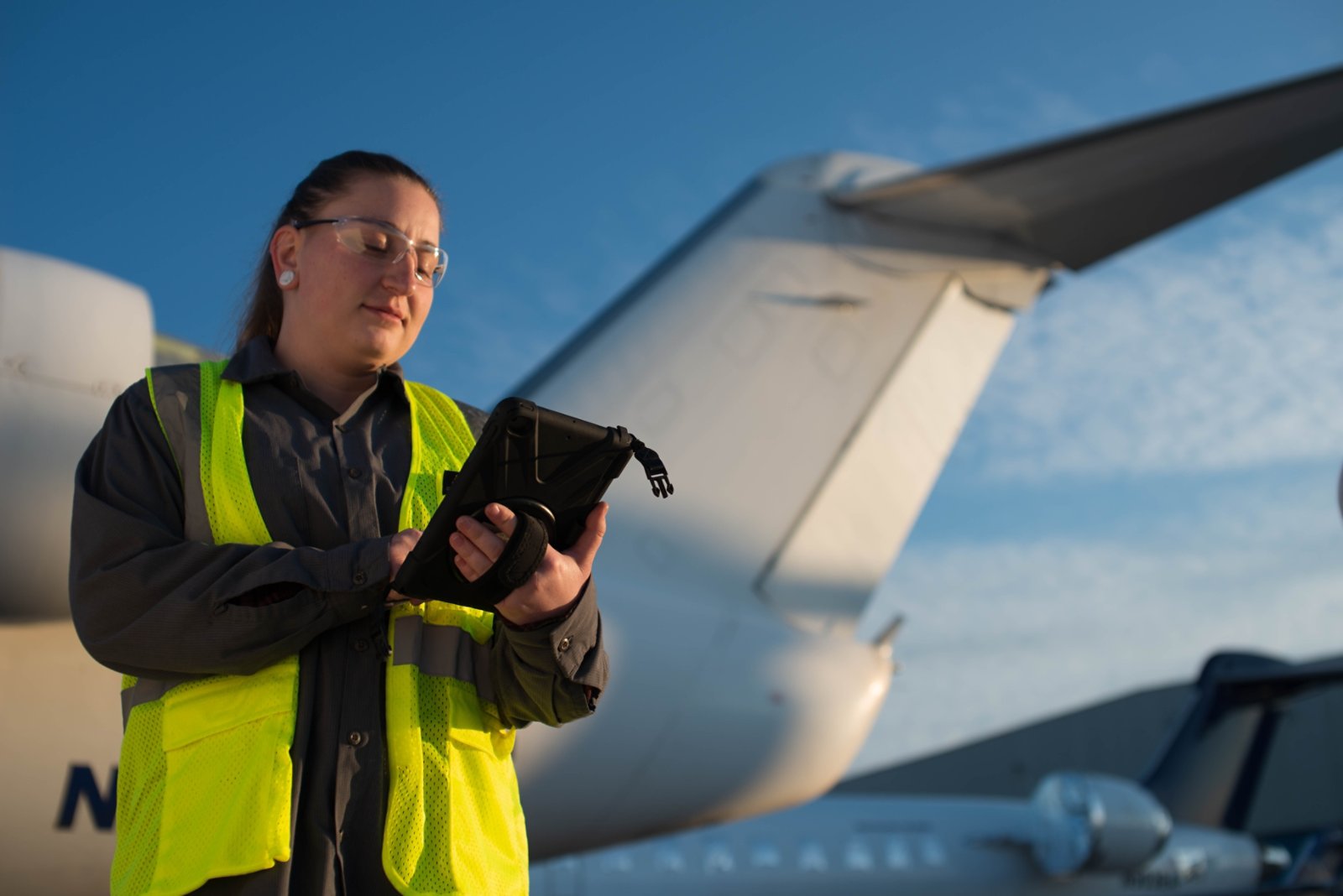 female worker using mobile device 2