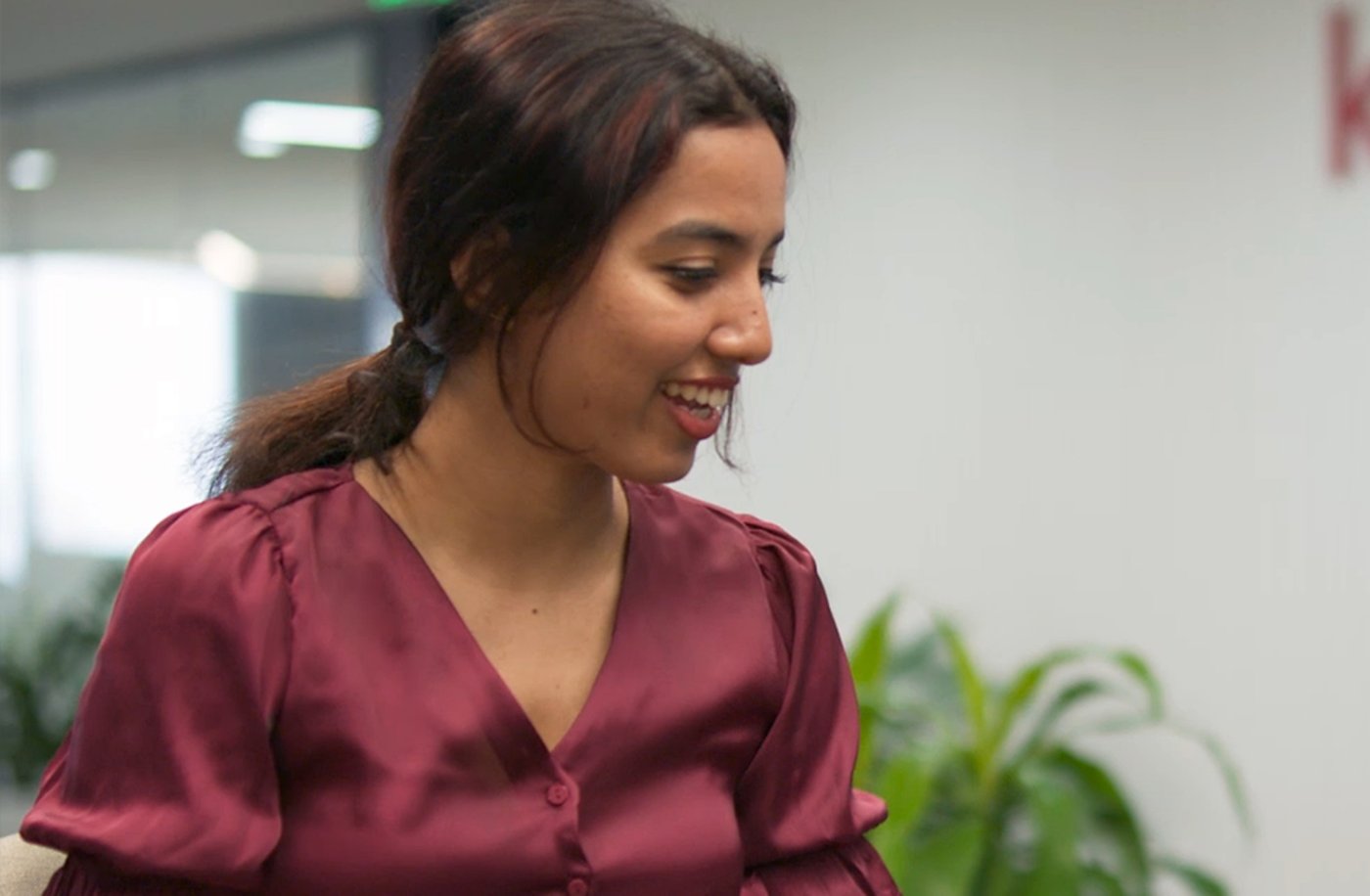 Female Employee from India in the midst of a conversation